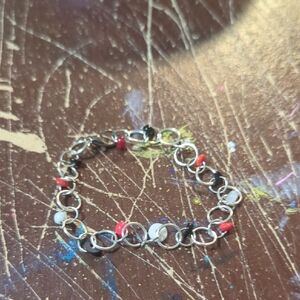 Elegant Silver and Red Beaded Bracelet
